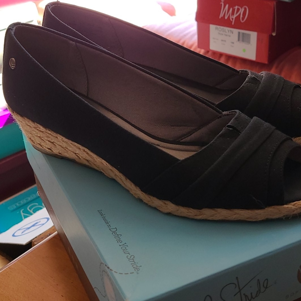 Cute Black Canvas open toe slip-ons.  9.5M